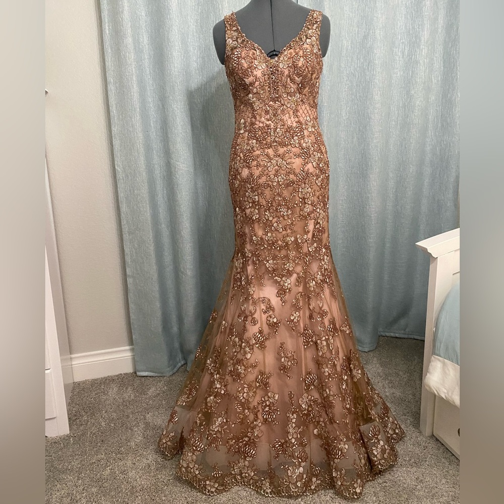 Formal dress by Yvonne D. Gold and tan lace with light New York pink lining.